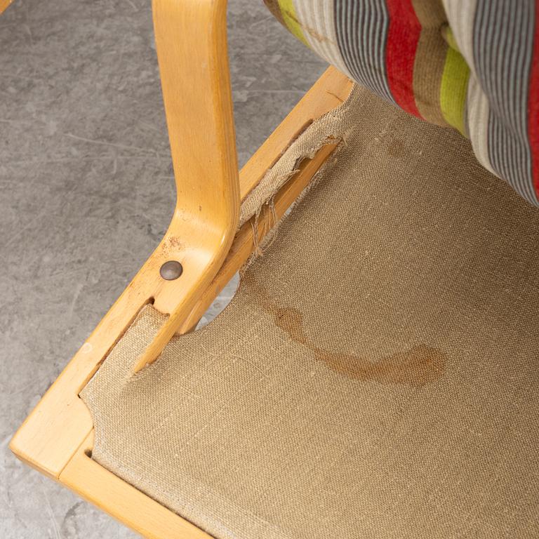 Bruno Mathsson, a pair of "ingrid" armchairs, Dux, Sweden, second half of the 20th century.