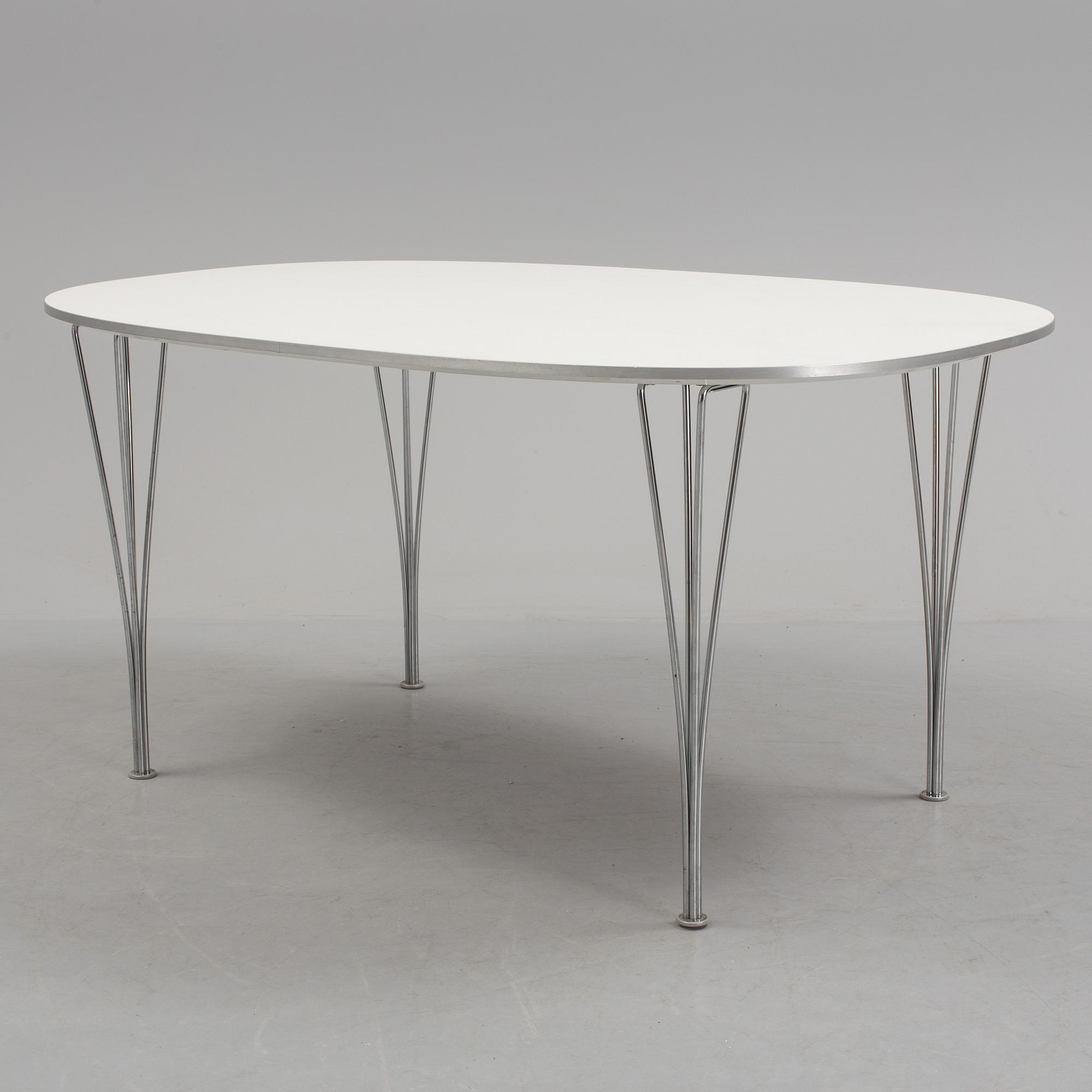 BRUNO MATHSSON AND PIET HEIN, a 'Superellips' dining table from Fritz Hansen, 2005.