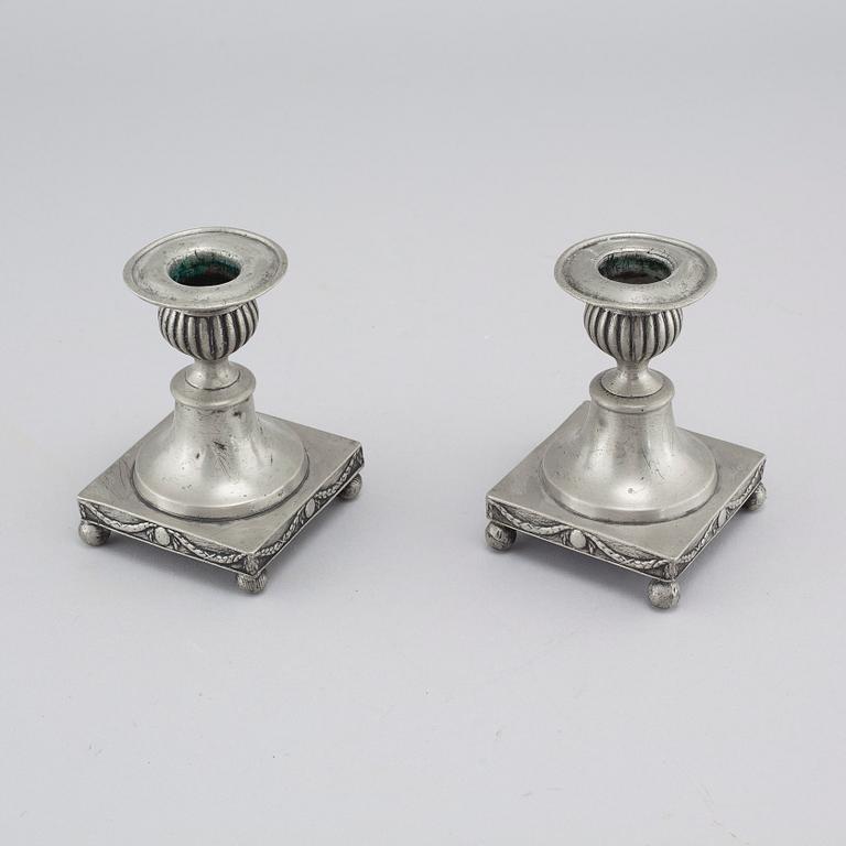 A pair of pewter candlesticks by Adolf Fredrik Moberg in Jönköping, 1824.