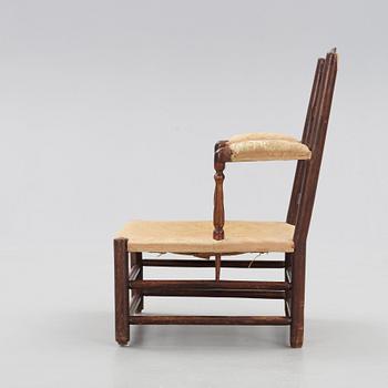 A Swedish Royal "Gripsholm" armchair.