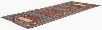 An antique Anatolian kilim, c. 374 x 148 cm.