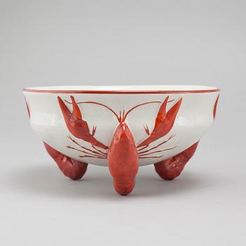 13 pieces of earthenware tableware from Rörstrand, first half of the 20th century.