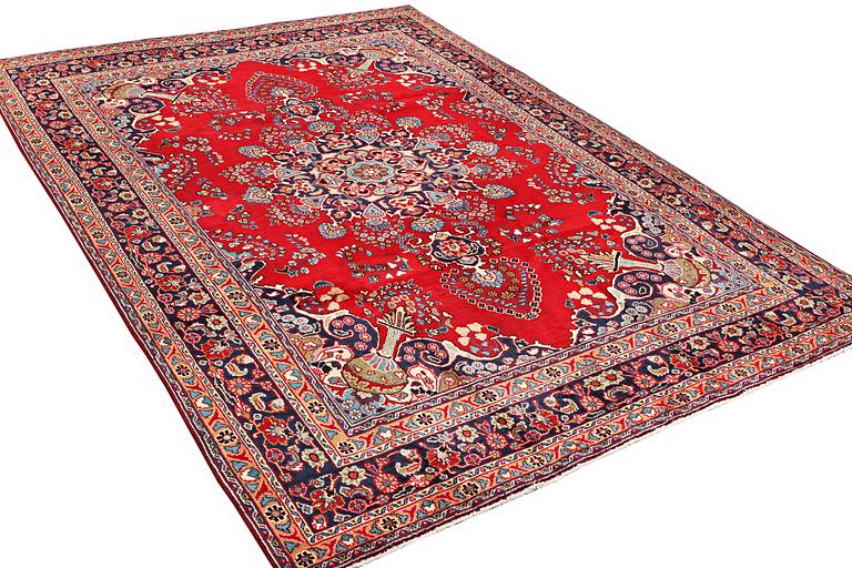 A carpet, Tabriz, ca. 338 x 243 cm.