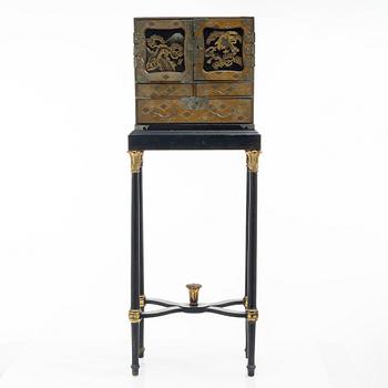 A maki-e cabinet on stand, Japan, 19th century.