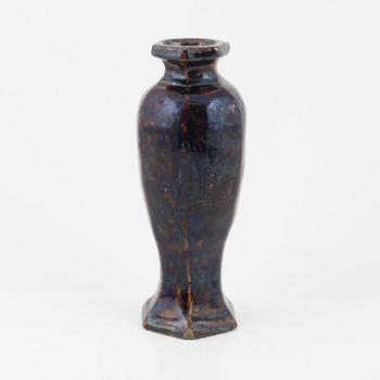 A brown glazed vas, Ming dynasty (1368-1644).