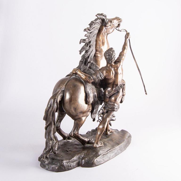 Guilliaume Coustou, after, a signed bronze sculpture  "Chevaux de Marly" from the second part of the 1800's.