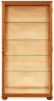 A Josef Frank mahogany and glass cabinet by Svenskt Tenn, model 649.