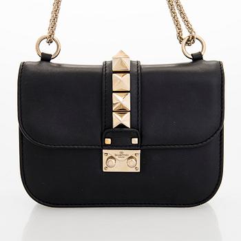 Valentino Garavani, a 'Glam Lock' bag.