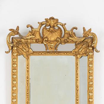 A Baroque style mirror, early 20th Century.