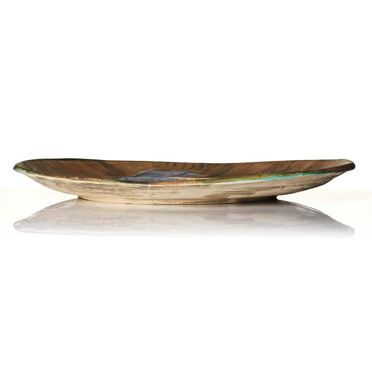 Pablo Picasso, a "Poisson" (see A.R. 166-171) faience dish, Madoura, Vallauris, France, post 1952.