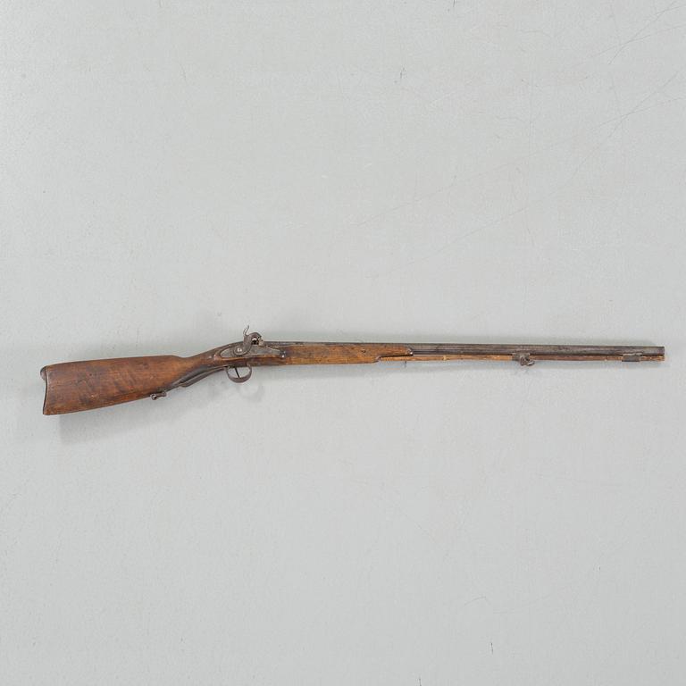 A percussion rifle, around the mid 19th century.