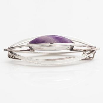 Elis Kauppi, A silver brooch/pendant with an amethyst. Kupittaan kulta, Turku 1961.