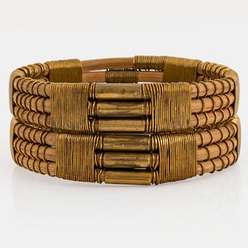 158. Vivianna Torun Bülow-Hübe, a rattan and brass bangle, executed in her own workshop, 1945-50's.