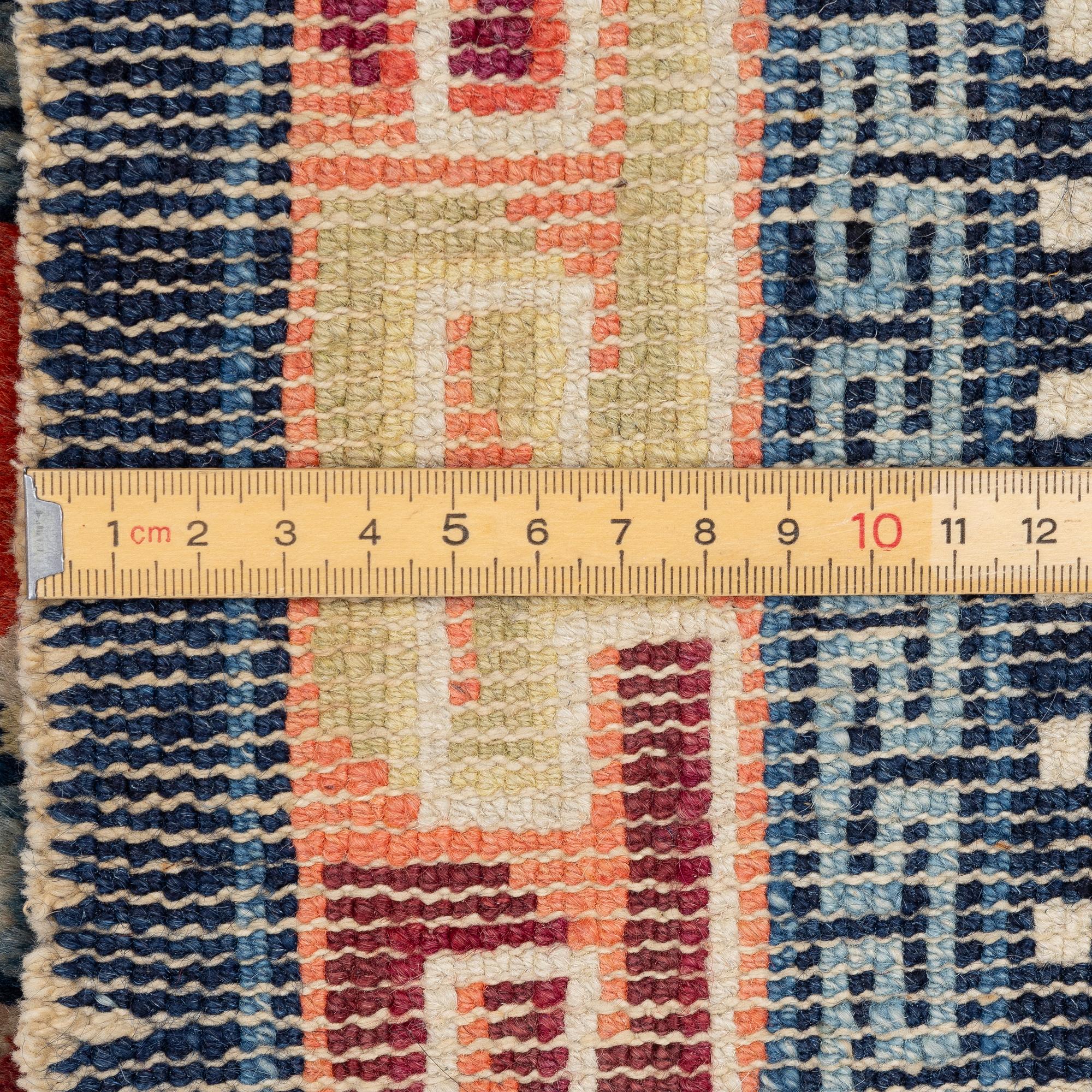 Carpet, antique China, approx. 128 x 67 cm.