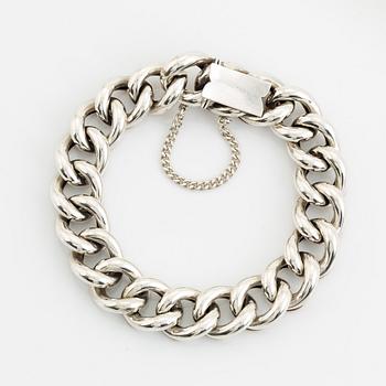 Silver bracelet.