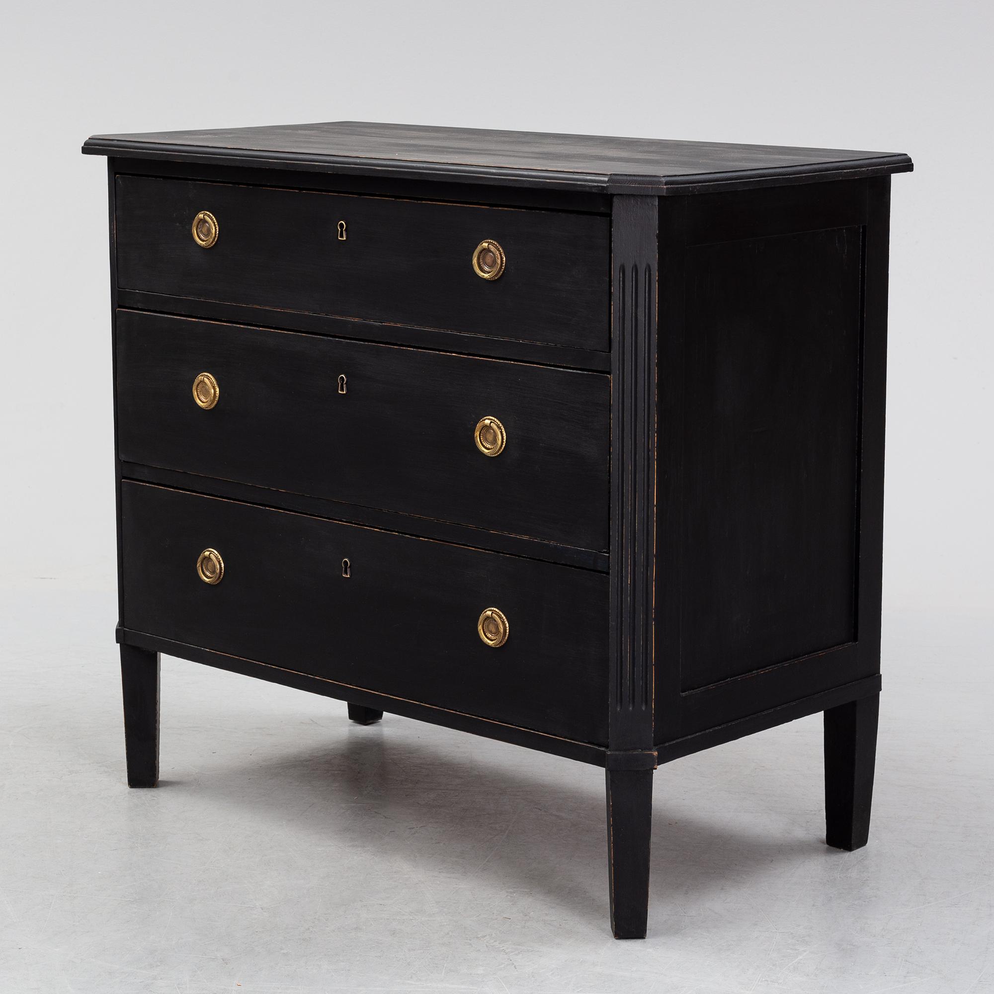 A painted chest of drawers, early 20th Century.