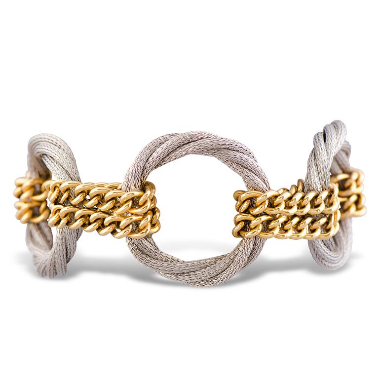 A BRACELET, 18K gold and white gold. Italy, import marks T. Tillander 2007.