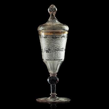 781. A German cut and engraved glass goblet with cover, 18th Century.