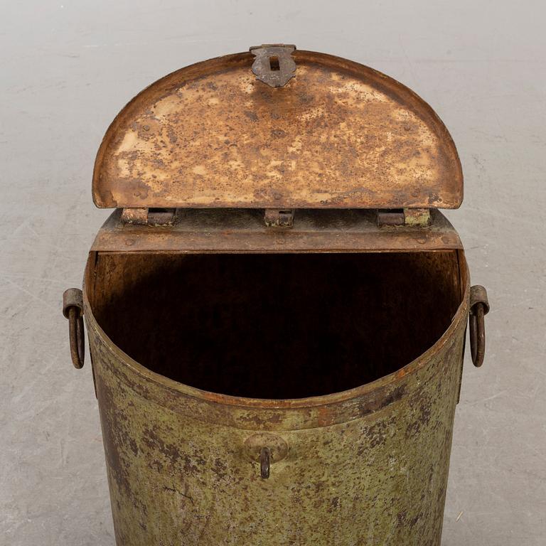 A 20th century metal barrel.