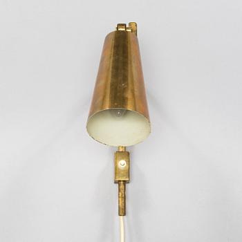 Paavo Tynell, a mid-20th-century reading light for Taito.