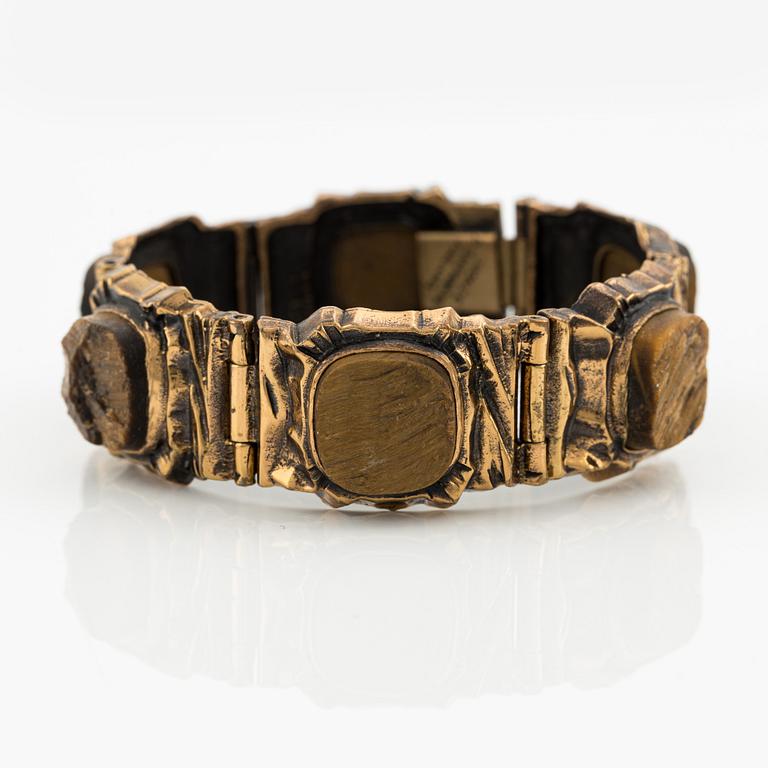 Pentti Sarpaneva, Bracelet and ring, bronze and tiger's eye.