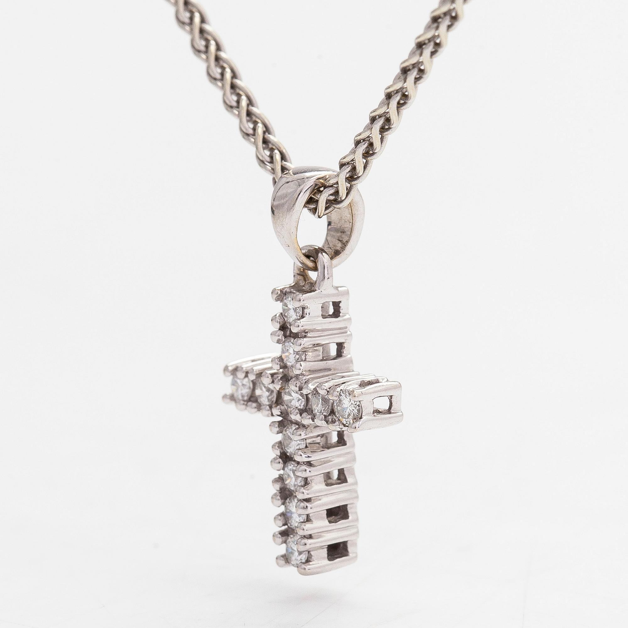Necklace/pendant, cross, 14K white gold with diamonds totalling approx. 0.25 ct. Finnish hallmarks.