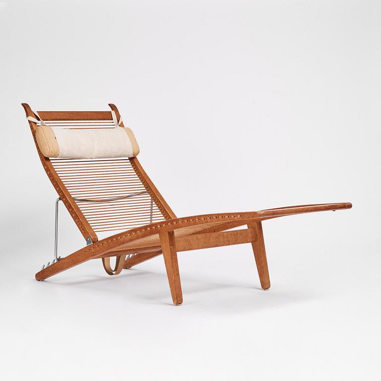 Hans J. Wegner, an oak lounge chair model "JH 524", Johannes Hansen, Copenhagen.