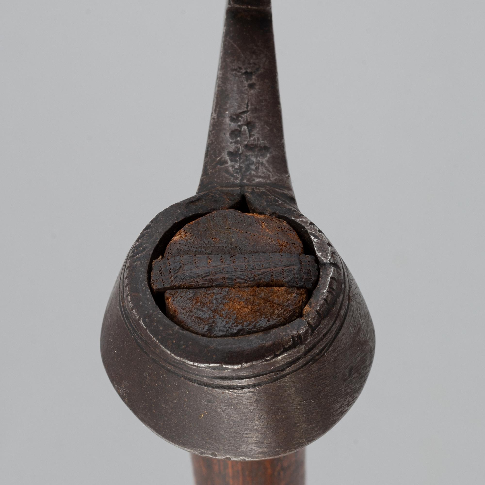 An Indian or possibly East African war axe, from around the year 1900.