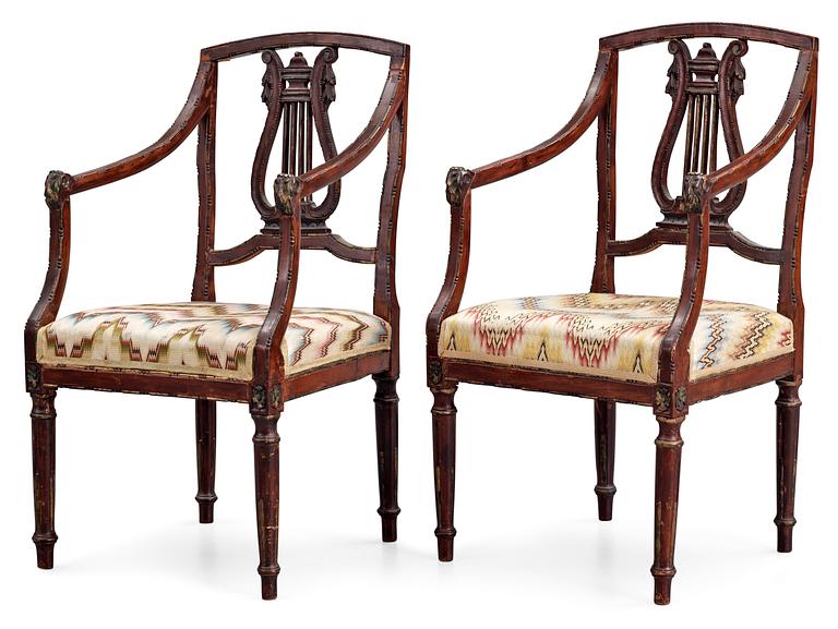 A pair of, probably Italian, 19th c. armchairs from Queen Victoria, Solliden. The embroidery by King Gustav V.