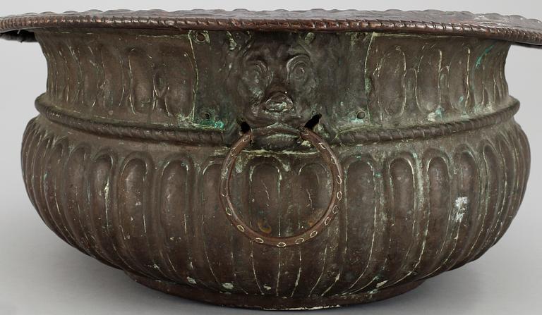 A Baroque copper wine cooler.