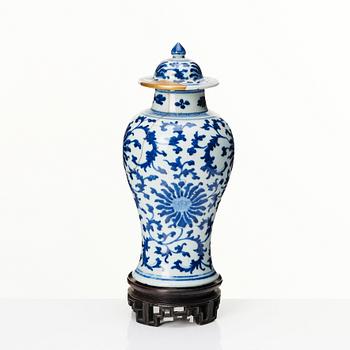 A Chinese blue and white lotus vase with cover, Qing dynasty, 18th Century.