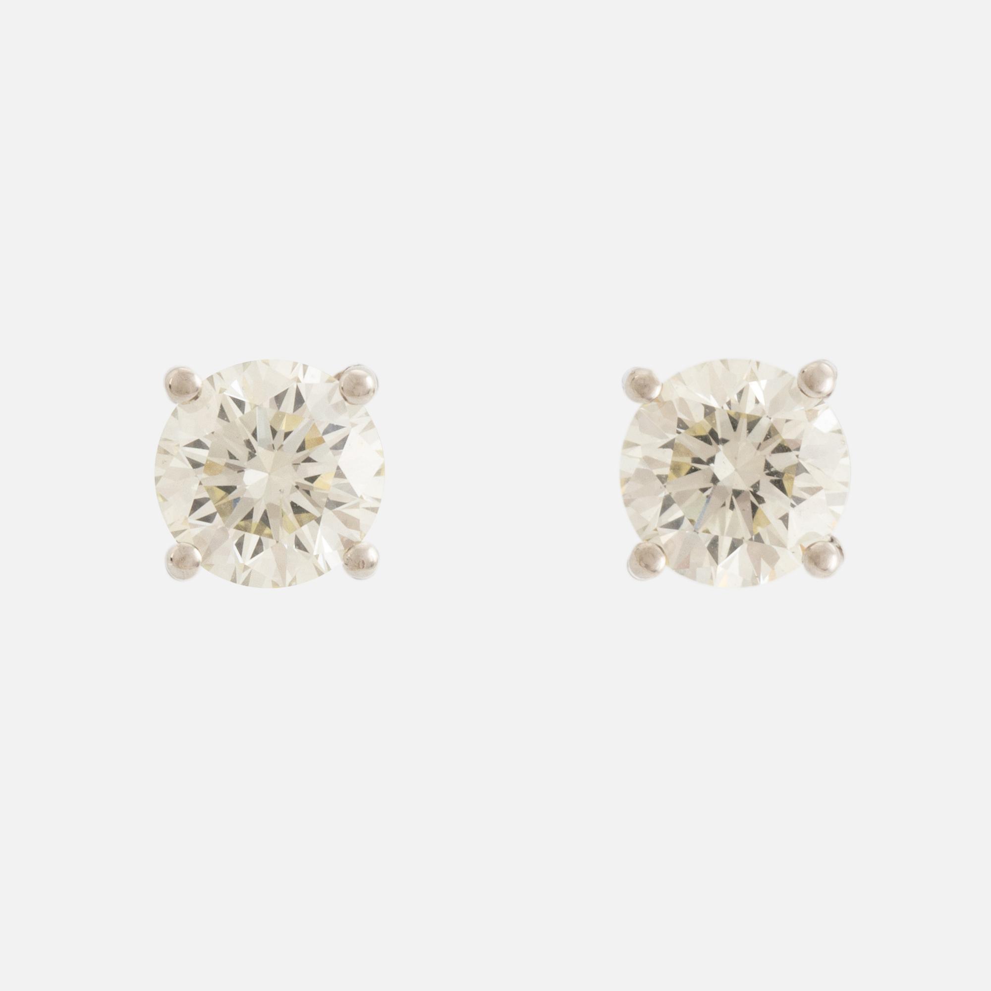 Brilliant cut diamond earrings.