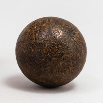 A gutta percha golf ball 19th century.