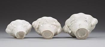 A set of three blanc de chine rhinoserous cups, Qing dynasty.