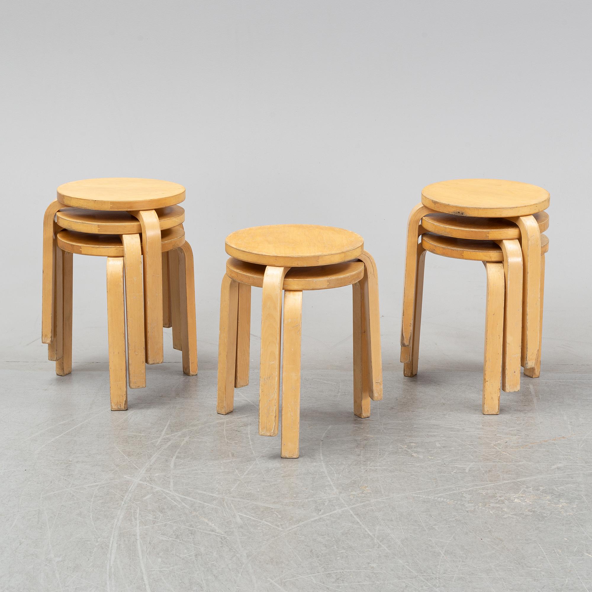 Alvar Aalto, a set of eight model 60 birch stools for Artek, Finland.