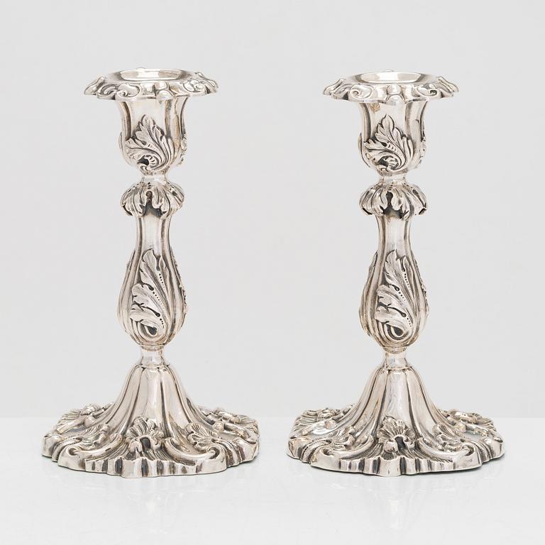 A pair of Rococo Revival silver candlesticks, maker's mark of Gustaf Dahlgren, Malmö, Sweden 1883.