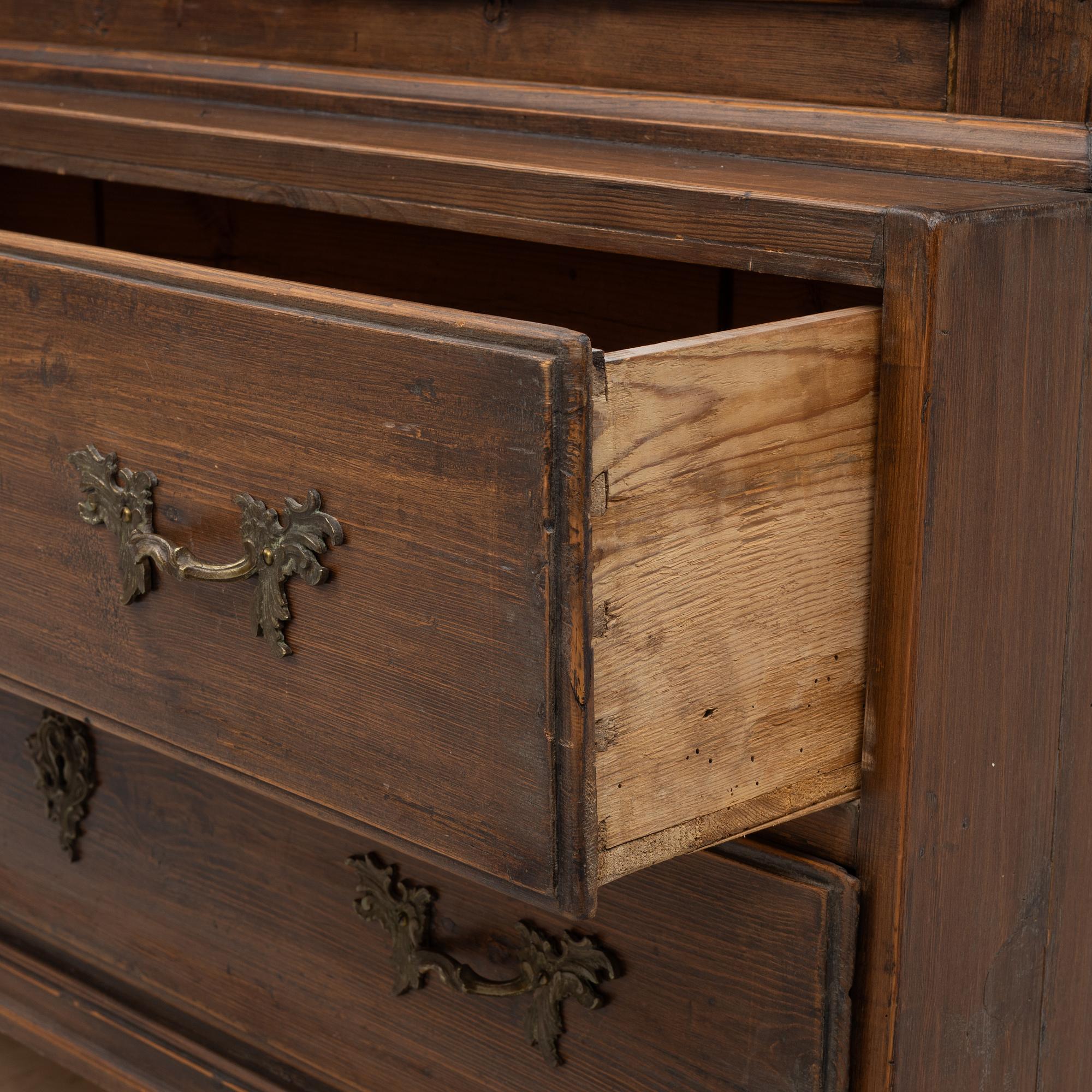 A display cabinet, 18th Century.
