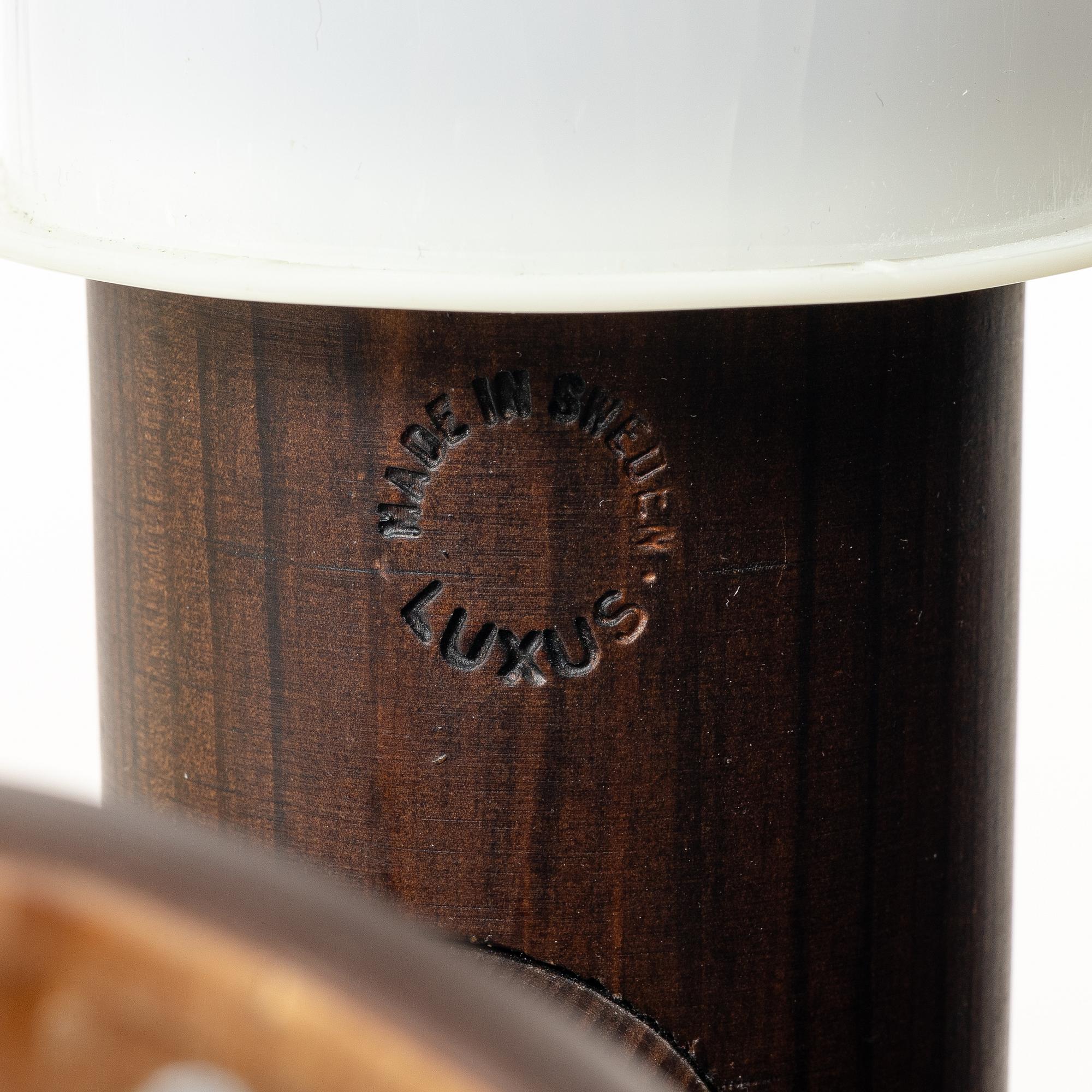 A pair of wall lamps, Luxus, Vittsjö.