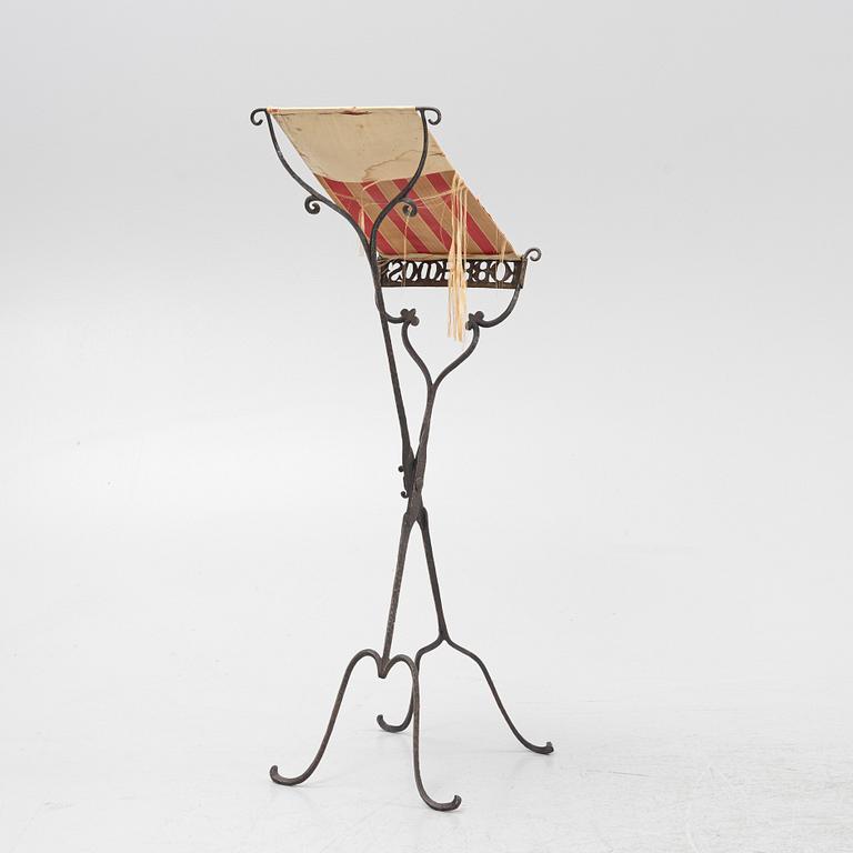 An iron book stand early 20th Century.