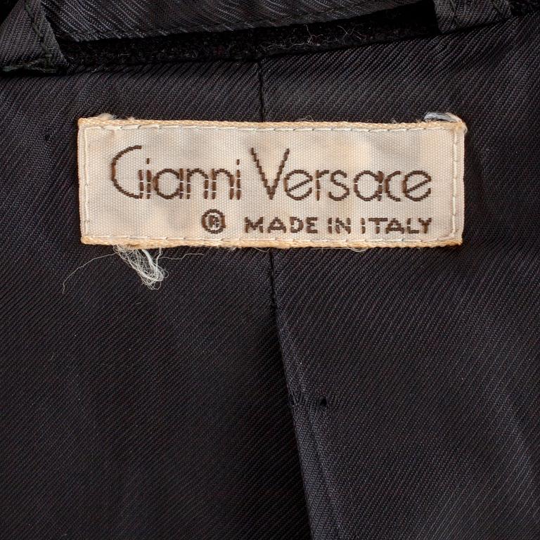 GIANNI VERSACE, a two-piece dress consisting of jacket and skirt.