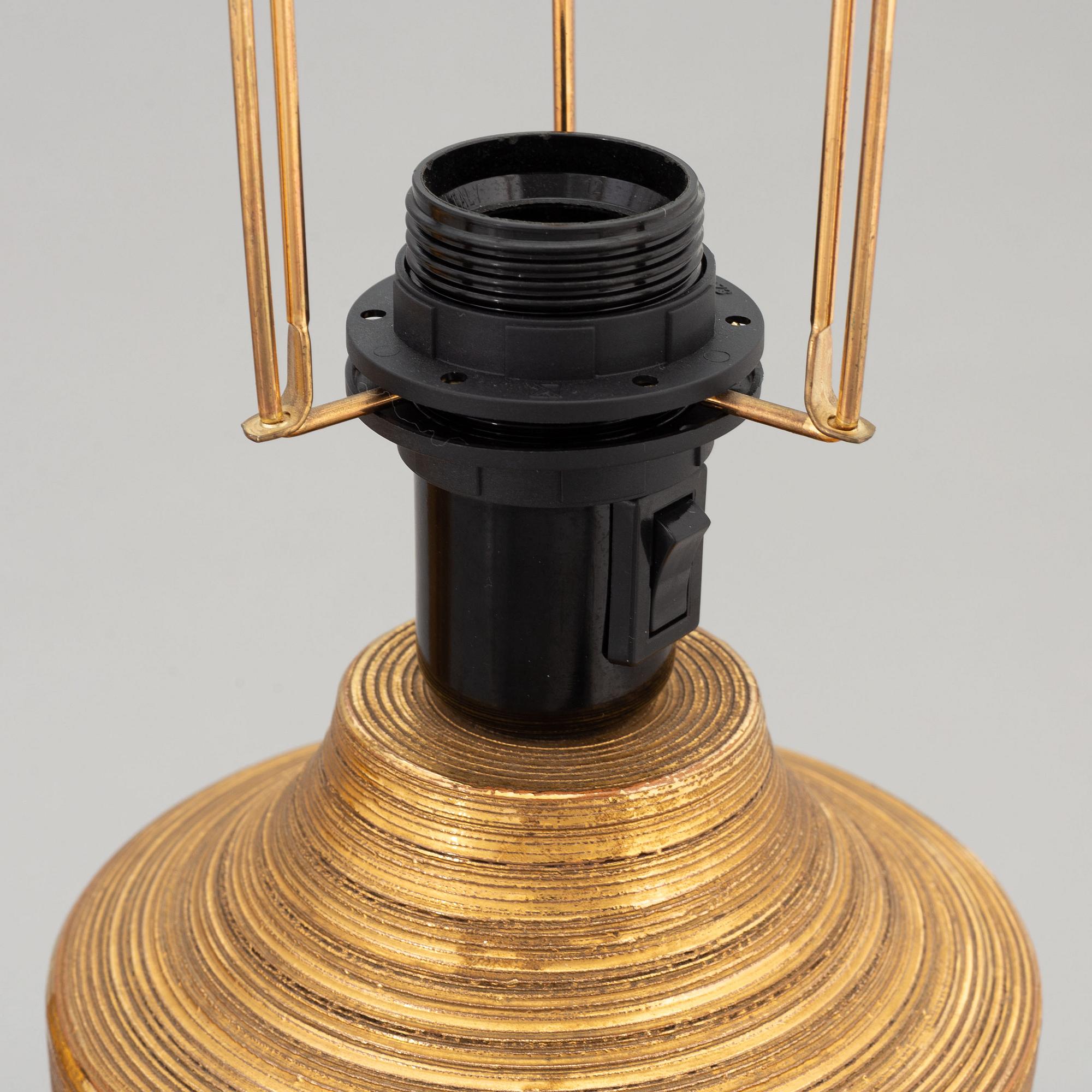 A pair of gold-foliated stoneware table lamps by Bitossi for Bergboms, 1960's/60's.