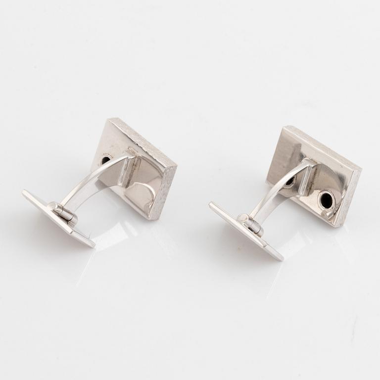 Bucherer 18K white gold and brilliant cut diamond cufflinks.