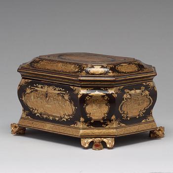 A lacquered tea box with pewter canisters, Qing dynasty, late 19th Century.