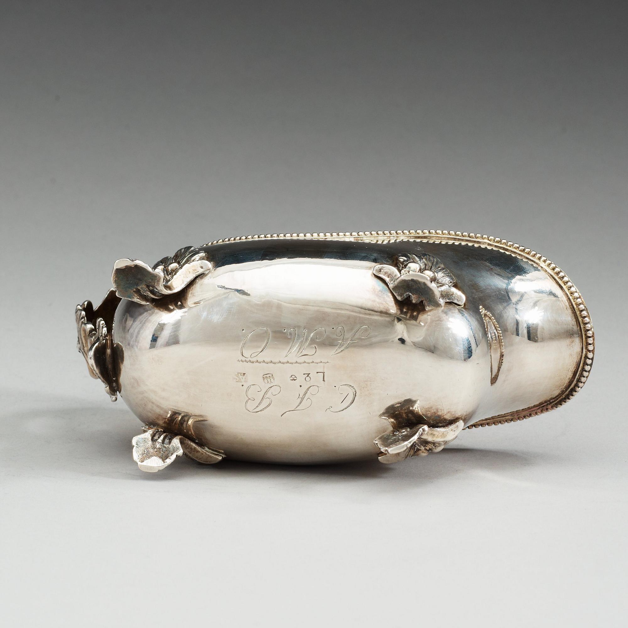 A Swedish 18th century parcel-gilt cream-jug, makers mark of Anders Schotte, Uddevalla 1793.