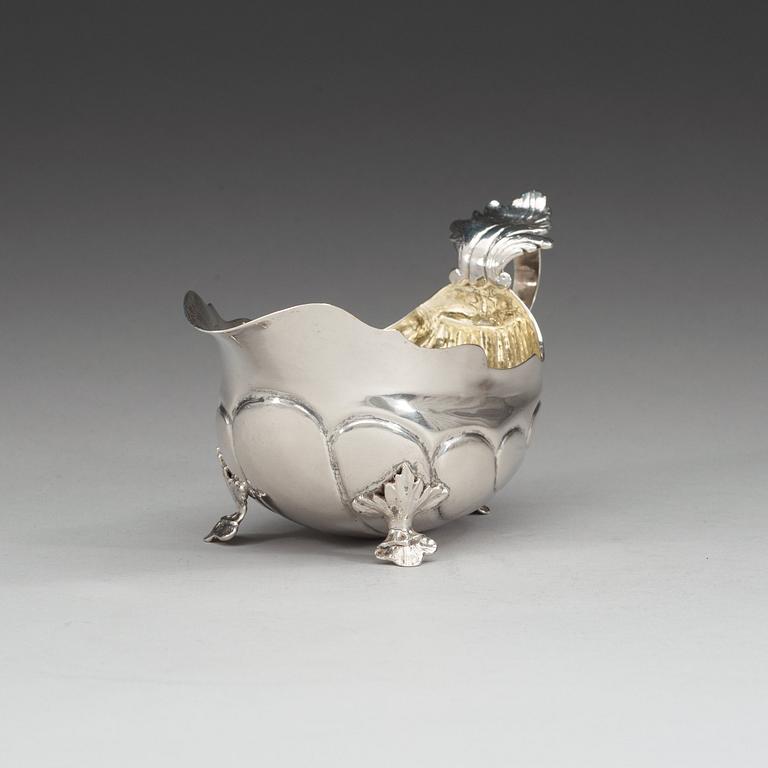 A Swedish 18th century parcel-gilt cream-jug, makers mark of Christian Rothe, Karlskrona 1777.