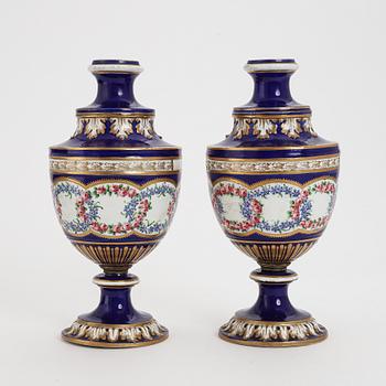 A pair of French porcelain vases, 19th Century. Sèvres style mark.