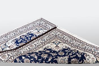A carpet, Nain, part silk, ca 205 x  152 cm.