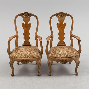 A pair of rococo style chairs.