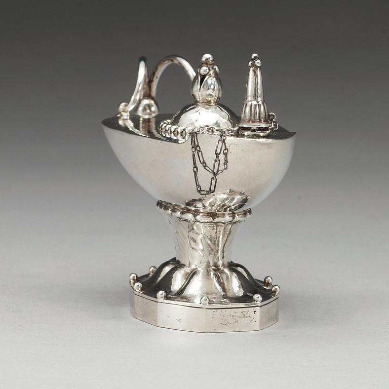 GEORG JENSEN, bordständare/ oljelampa, Köpenhamn 1915-19, 830/1000 silver.