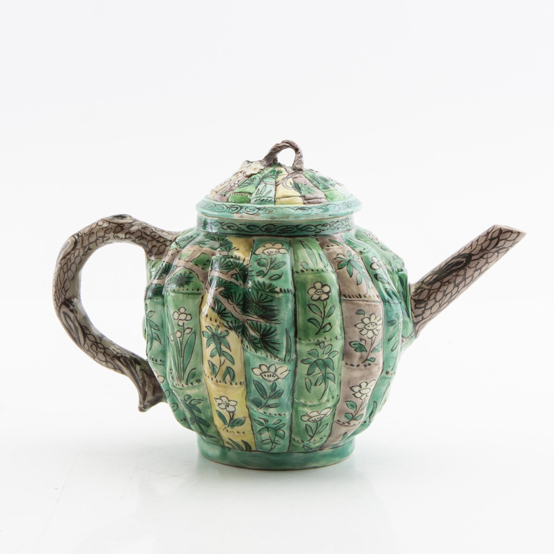 A set of three differently decorated tea pots with covers, Qing dynasty, 18century and 20th century.